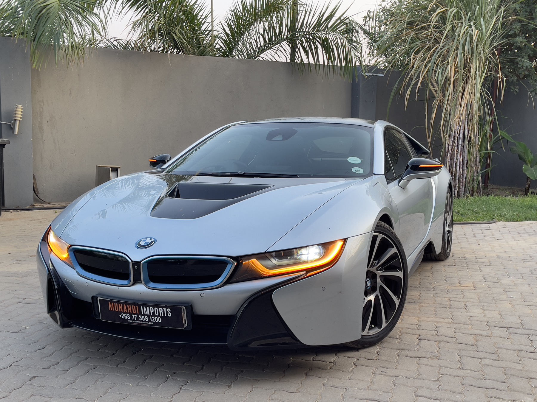 BMW i8 import vehicle with Munandi Imports branding