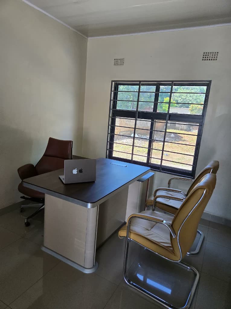 Munandi Capital Lusaka office — meeting table and chairs